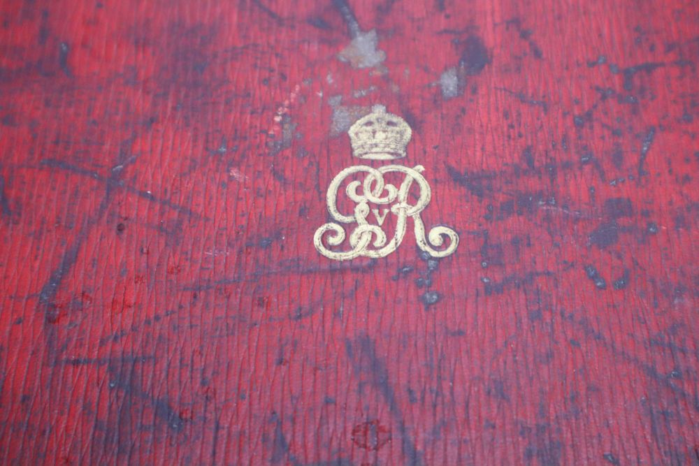 A red leather despatch box bearing King George V royal cypher, locked with key inside, width 41cm